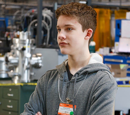 Cyrus Shupe watches a demonstration performed by staff in the SNS instrument hall. (Photo Credit: Carol Morgan/ORNL, U.S. Dept. of Energy)