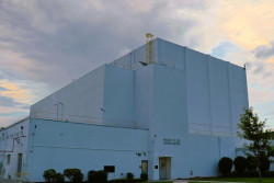Photograph of the High Flux Isotope Reactor (HFIR) building at Oak Ridge National Laboratory, showin