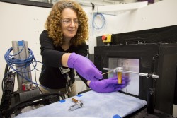 ORNL researcher Joanna McFarlane, prepares to test a sample with the IMAGING beamline at the High Flux Isotope Reactor. (Image credit: ORNL/Genevieve Martin)