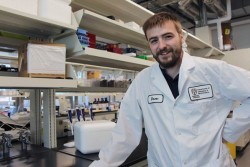 Drew Marquardt, together with fellow UWindsor researchers James Gauld and Charu Chandrasekera, is exploring how an ingredient in vapes and e-cigarettes poses complications for those infected with the virus that causes COVID-19. (credit: University of Windsor)