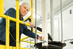 Michael Crawford from DuPont is studying hybrid perovskites at TOPAZ, SNS beam line 12, with hopes of influencing the development of better photovoltaics. Credit: Genevieve Martin/ORNL