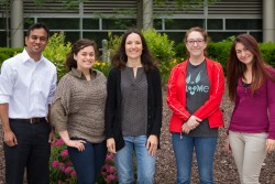 Flora Meilleur, center, is the coordinator for the seventh annual Neutron Scattering Applications in Structural Biology workshop. Here she is shown with four student participants, from left to right: Suchi Perera, Nayomi Plaza, Meilleur, Leiah Carey, and Zumra Peksaglam. (Image credit: Genevieve Martin/ORNL)