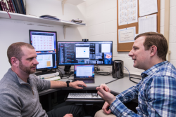 Marc Janoschek, left, and David Fobes discuss features of quantum materials. (Image Credit: Los Alamos National Laboratory)