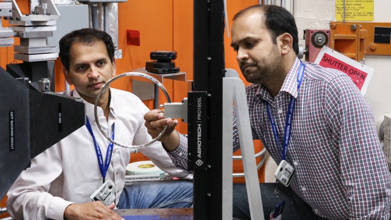 Timken researchers Vikram Bedekar (left) and Rohit Voothaluru