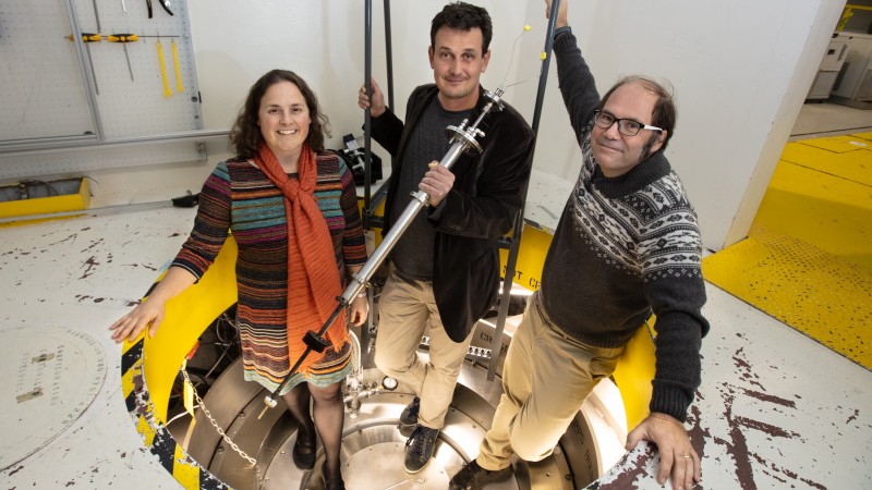 Researchers led by Brookhaven National Laboratory used neutrons at ORNL’s Spallation Neutron Source to aid in deciphering the mechanism underlying scandium fluoride’s ability to shrink upon heating. (Left) Kate Page, formerly of Oak Ridge National Laboratory, Brookhaven Lab physicist Emil Bozin, and ORNL instrument scientist Joerg Neuefeind. Credit: Genevieve Martin/Oak Ridge National Laboratory