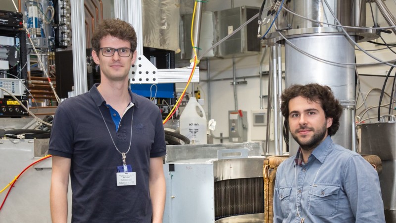 Investigating the realization of quantum spin ice, researchers Romain Sibille (left) and Nicolas Gauthier are the first users to use HYSPEC’s upgraded supermirror array built by their colleagues at the Paul Scherrer Institute in Switzerland. (Image credit: ORNL/Genevieve Martin)
