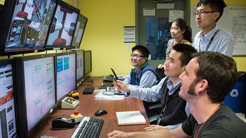 From left to right: Wei Wu from ORNL; Wenli Song, Yuan Wu, and Jie Zhou from the University of Science and Technology, Beijing; and Harley Skorpenske from ORNL, are studying metallic glass at VULCAN, SNS beam line 7.