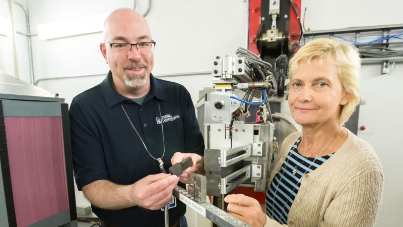Robert Carter from NASA’s Glenn Research Center (left) and Daira Legzdina from Honeywell Aerospace (right) examined high temperature nickel alloy samples containing linear friction welds using VULCAN, SNS beam line 7. Image credit: Genevieve Martin/ORNL