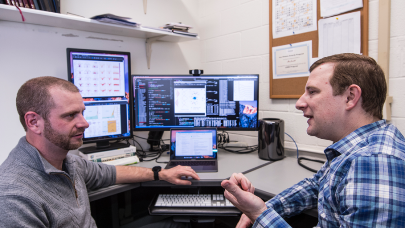 Marc Janoschek, left, and David Fobes discuss features of quantum materials. (Image Credit: Los Alamos National Laboratory)