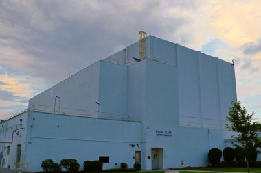 Photograph of the High Flux Isotope Reactor (HFIR) building at Oak Ridge National Laboratory, showin