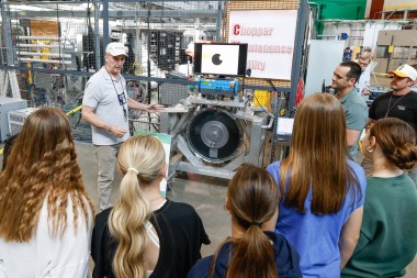Jerry Stockton, Group Leader for Neutron Choppers, presents to a group of students at one of the sev