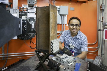 TTCI researcher Dr. Ananyo Banerjee uses HFIR’s HB-2B instrument to analyze residual stresses on a worn section of rail, aiming to develop new improvements for rail reliability. (Image credit: ORNL/Genevieve Martin)